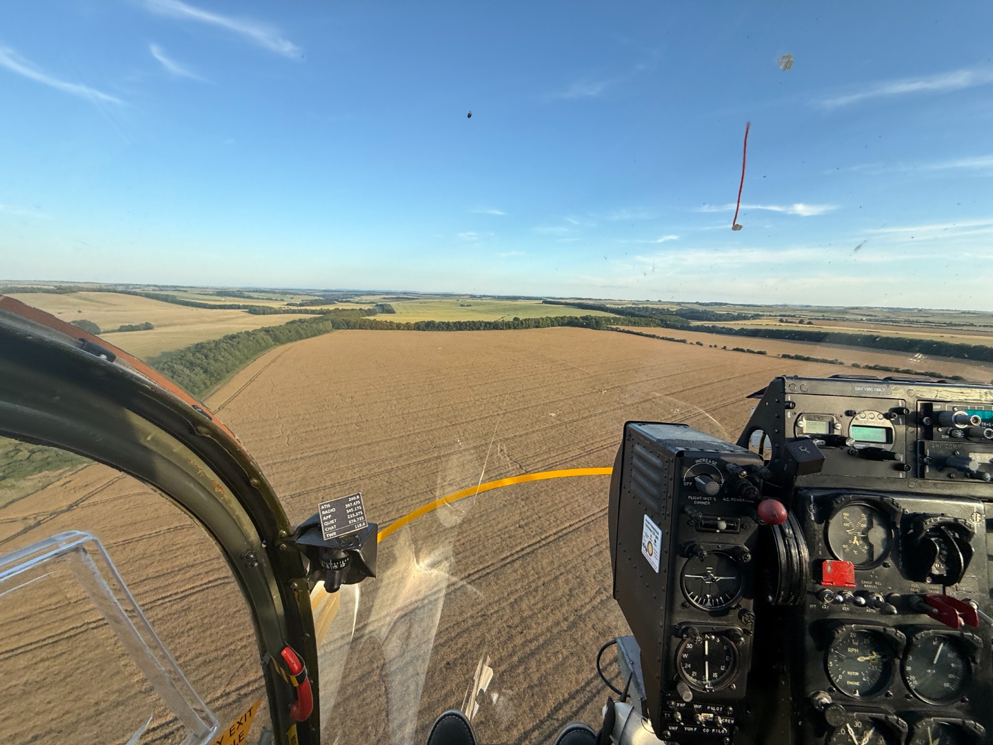 Cockpit panel and forward view during a real training flight